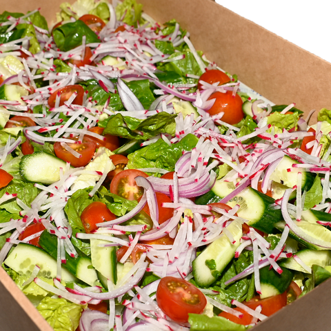 Garden salad with baby cos lettuce, cherry tomatoes, cucumber, Spanish onion, and radish, perfect for vegan and gluten-free catering in Sydney.