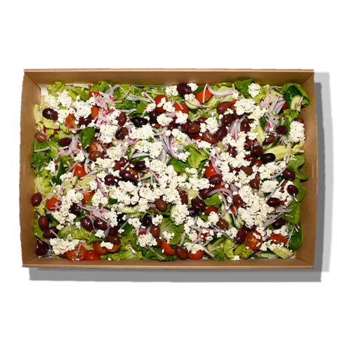 Greek salad with baby cos, barrel-aged feta, cherry tomatoes, cucumber, olives, and lemon olive oil dressing, perfect for vegan and gluten-free catering in Sydney.