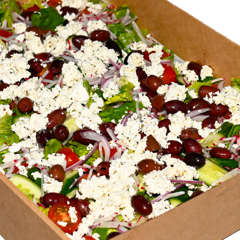 Greek salad with baby cos, barrel-aged feta, cherry tomatoes, cucumber, olives, and lemon olive oil dressing, perfect for vegan and gluten-free catering in Sydney.
