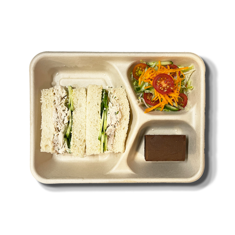 Sandwich Lunch Box with Tuna & Cucumber, Deviled Egg, or Chicken & Tarragon sandwiches, garden salad, and chocolate brownie, perfect for catering in Sydney.