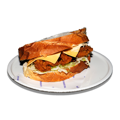 Spicy fried chicken sandwich with crumbed chicken, Sriracha, hot sauce aioli, slaw, and American cheese, perfect for spicy food lovers in Sydney.