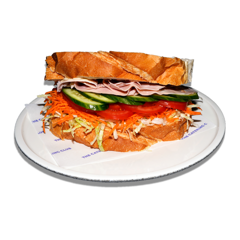 OG Ham sandwich with smoked ham, shredded lettuce, carrot, tomato, cucumber, dijonaise, and spring onion, perfect for dairy-free catering in Sydney.