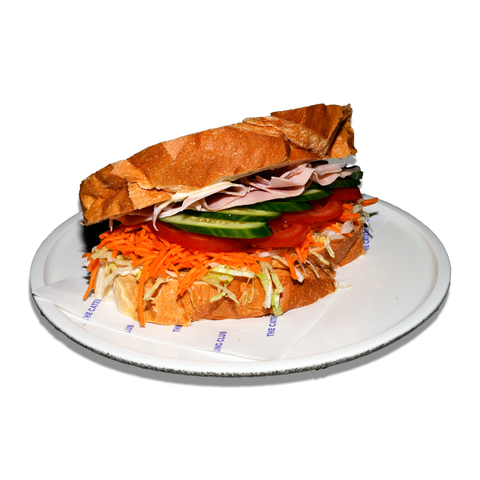 OG Ham sandwich with smoked ham, shredded lettuce, carrot, tomato, cucumber, dijonaise, and spring onion, perfect for dairy-free catering in Sydney.