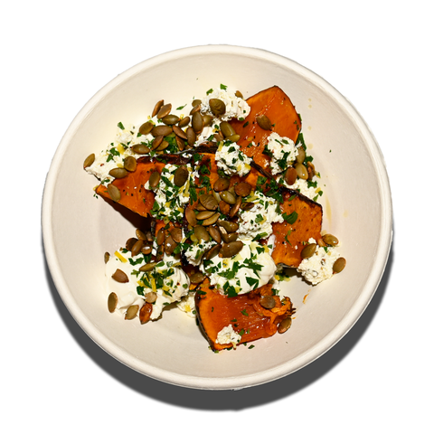Roast Japanese pumpkin with activated pumpkin seeds, aged feta, and gremolata, perfect for gluten-free and vegan catering in Sydney.