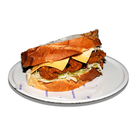 Smokey BBQ crumbed chicken sandwich with free-range chicken, BBQ sauce, shredded lettuce, and American cheese, perfect for BBQ lovers in Sydney.